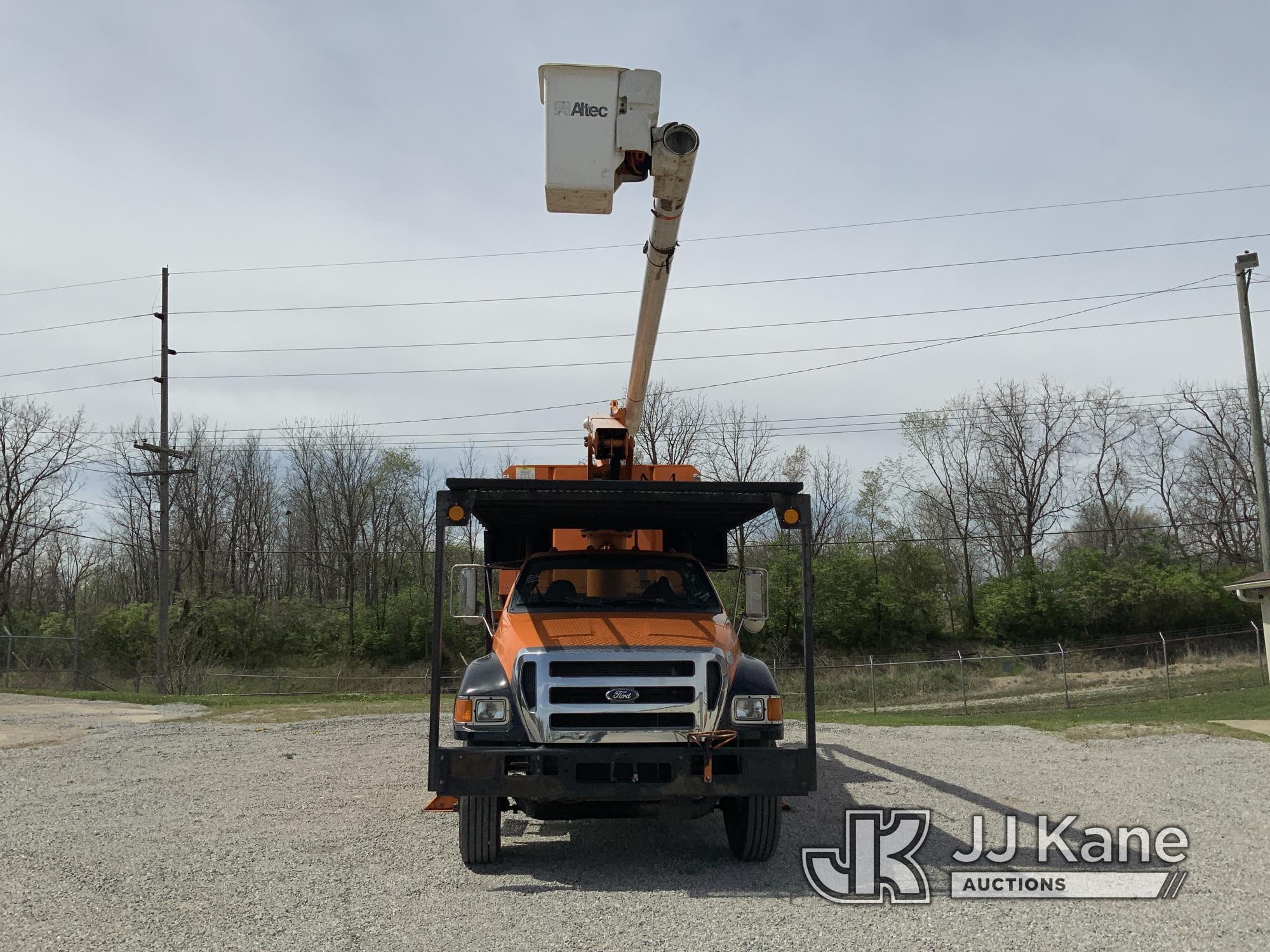 (Fort Wayne, IN) Altec LR756, Over-Center Bucket Truck mounted behind cab on 2013 Ford F750 Chipper