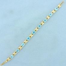 14ct Tw Swiss Blue Topaz And Diamond Line Bracelet In 14k Yellow Gold