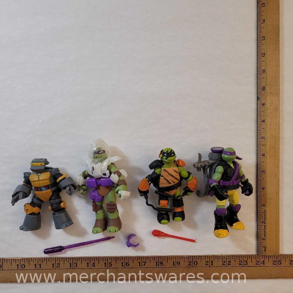 Four Teenage Mutant Ninja Turtles Action Figures including 2012 Ooze Scoopin' Donatello, 2012