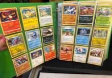 Binder of Assorted Pokemon Cards with Stars Cards and Pikachu