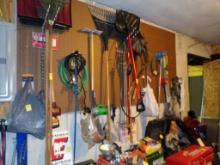 Contents of Peg Board Wall - Snow Shovels, Leaf Rakes, Pitch Fork, Tool Bel