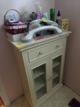 White Cabinet With Contents (See Photo) 24'' X 12'' X 35'' (Bathroom)