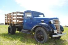 **T** 1938 Chevy Truck, title says Model PK, 8'x7' wood stake box, runs & drives, needs tune-up, has