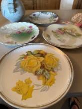 Many painted plates, Wright County Court House plate (Clarion, Ia.), ceramic tea pot and cups,
