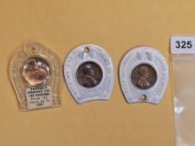 Three cool encased Cents