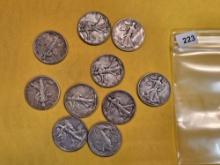 Ten mixed Walking Liberty half Dollars