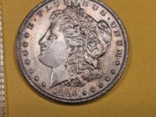Better grade 1886-O Morgan Dollar