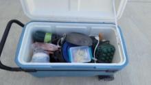 igloo cooler, foldout handle with assorted camping goods