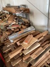 Various lumber pieces and rack
