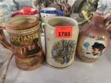 3 pc collectable mugs and bottle.