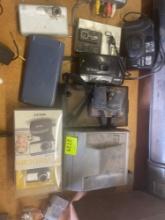 Miscellaneous cameras and polaroids.