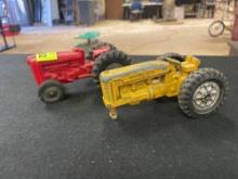 2 Toy Tractors, 1 Yellow Metal Hubley, and 1 Red Plastic Wyandotte Toy