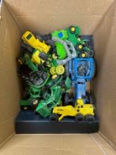 Box Full of Assorted Tractors and Farm Equipment Toys