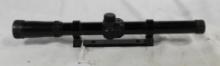 One Daisy 4x15 22/BB rifle scope with rings, base and scope covers. Used.