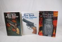 Three softcover Blue Book of Gun Values, #39, #34 and #38 editions