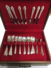 Chest of 48 pc. Sterling Silver, 1345 grams (Forks, Spoons, Butter Knives)