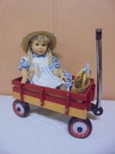 Beautiful Girl Doll in Wooden Wagon