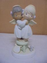 Precious Moment's "Angels We Have Heard on High" Figurine