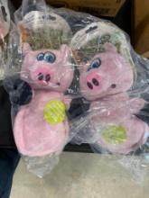 TWO PIG DOG TOYS