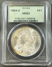 1884-O Morgan Silver Dollar in PCGS MS63 holder