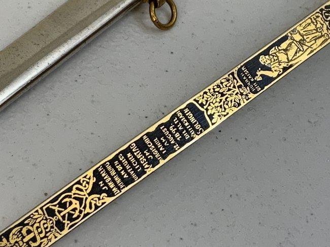 IMPERIAL GERMANY MINIATURE PRESENTATION SWORD WITH ENGRAVED GILDED BLADE