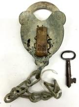Padlock brass key, marked D.M. Co