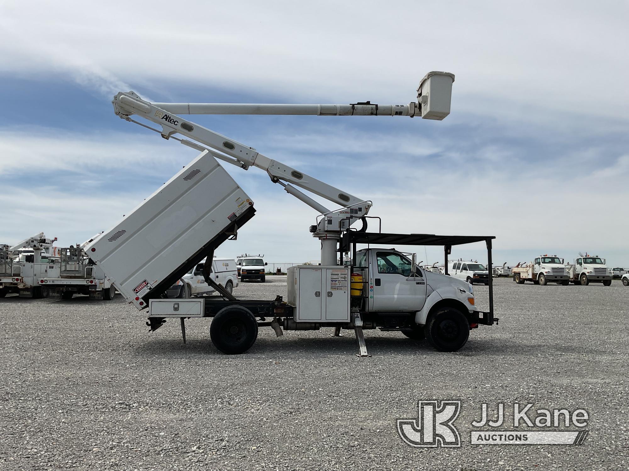 (Hawk Point, MO) Altec LR756, Over-Center Bucket mounted behind cab on 2013 Ford F750 Chipper Dump T