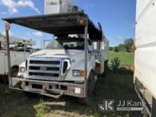 Altec LR756, Over-Center Bucket Truck mounted behind cab on 2013 Ford F750 Chipper Dump Truck Has Po