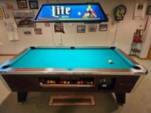 Great American pool table with accessories.