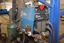 Miller XMT 304 Welder w/Miller 22A Feeder; Feeder has new stinger.; Item in use until plant closure.