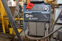 Miller 304 XMT Welder Power Source w/Miller 60 Series Feeder; Item in use until plant closure.