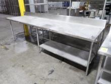 stainless table w/ backsplash & 1/2 undershelf