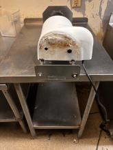 S/S Table with Attached Curly Fry Machine - See photos for additional details and specs.