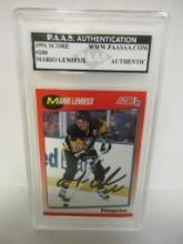 Mario Lemieux of the Pittsburgh Penguins signed autographed slabbed sportscard PAAS Holo 946