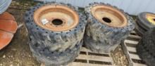 (4) SOLID 33X12X20 SKID LOADER TIRES AND RIMS