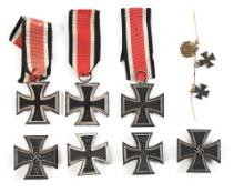 LOT OF GERMAN WWI AND WWII IRON CROSSES.