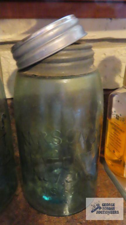 Three vintage canning jars with zinc lids