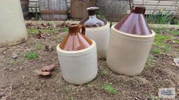 Three brown jugs