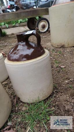Three brown jugs
