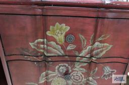 Three drawer floral cabinet