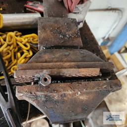 Heavy duty vise with bench. Vise needs new jaws.