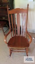 Wooden rocker with bent arms