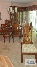 Fruitwood table with two glass inserts and eight chairs made by American of Martinsville Furniture