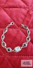 Silver color bracelet with multicolored stones marked 925 17 G (Description provided by seller)