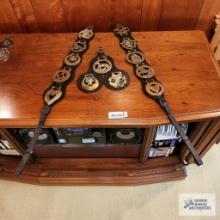 Lot of horse bridle decorations with holders
