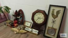 Miscellaneous items including wall clocks, light, eagle...plaque, small totem...pole and etc