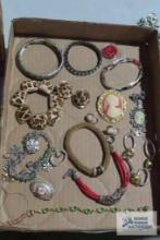 Lot of assorted costume jewelry bracelets and brooches