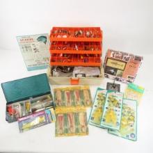 Vintage tackle boxes and fishing lures, some NIP