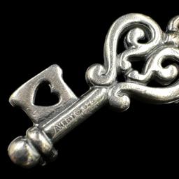 Estate James Avery sterling silver scroll key charm