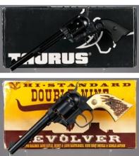 Two Revolvers with Boxes